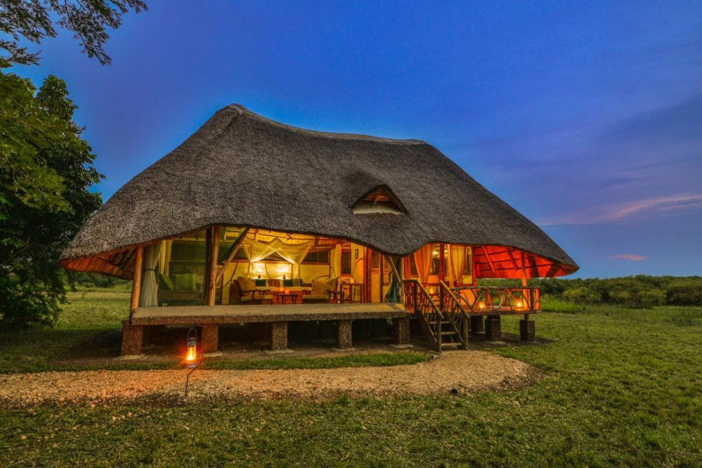 A night view of one of the cottages at Baker's Lodge, Murchison Falls National Park.