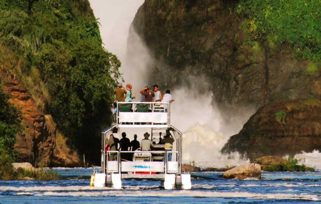 Guests on a boat cruise to Murchison Falls, part of the 4-day Murchison Falls and Nile Delta tour in Murchison Falls National Park.