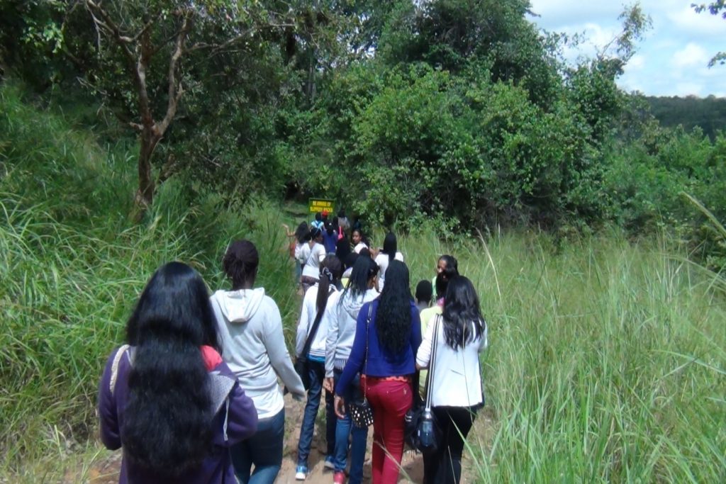 Students on a nature walking safari part of what to experience in Murchison Falls nature walks.